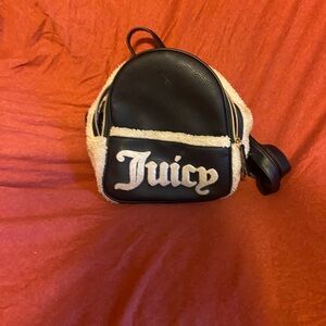 Juicy Couture Black and Cream Logo Interior